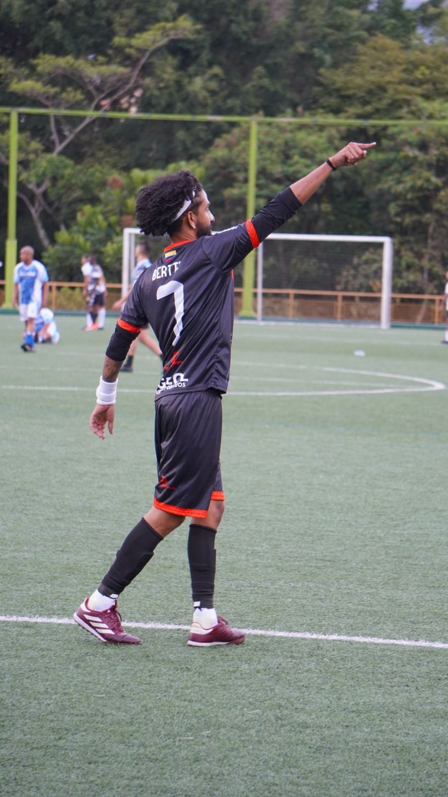 Cantera FIT Club — jugador celebrando en cancha
